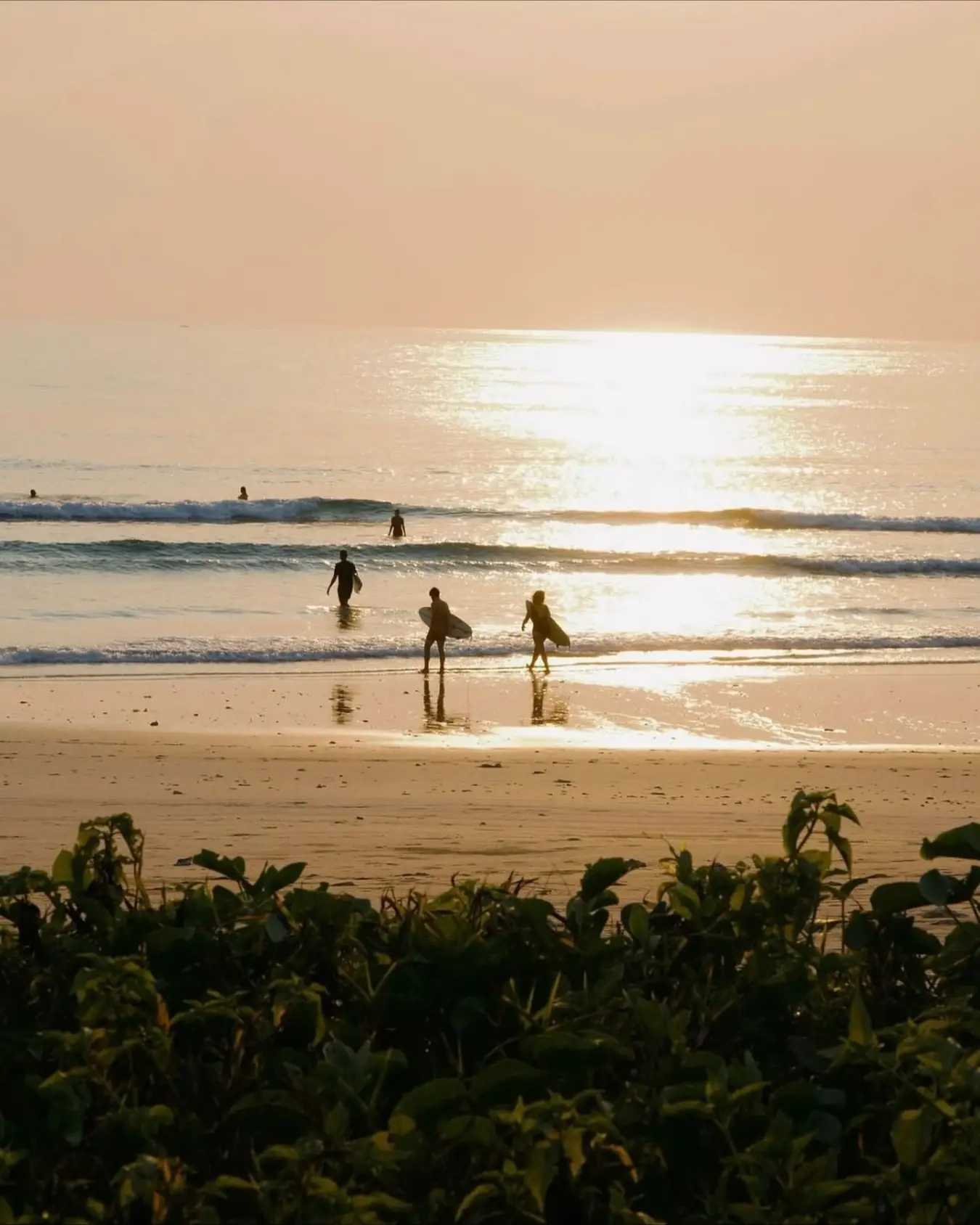 Golden light, soft waves, and time that feels unhurried.