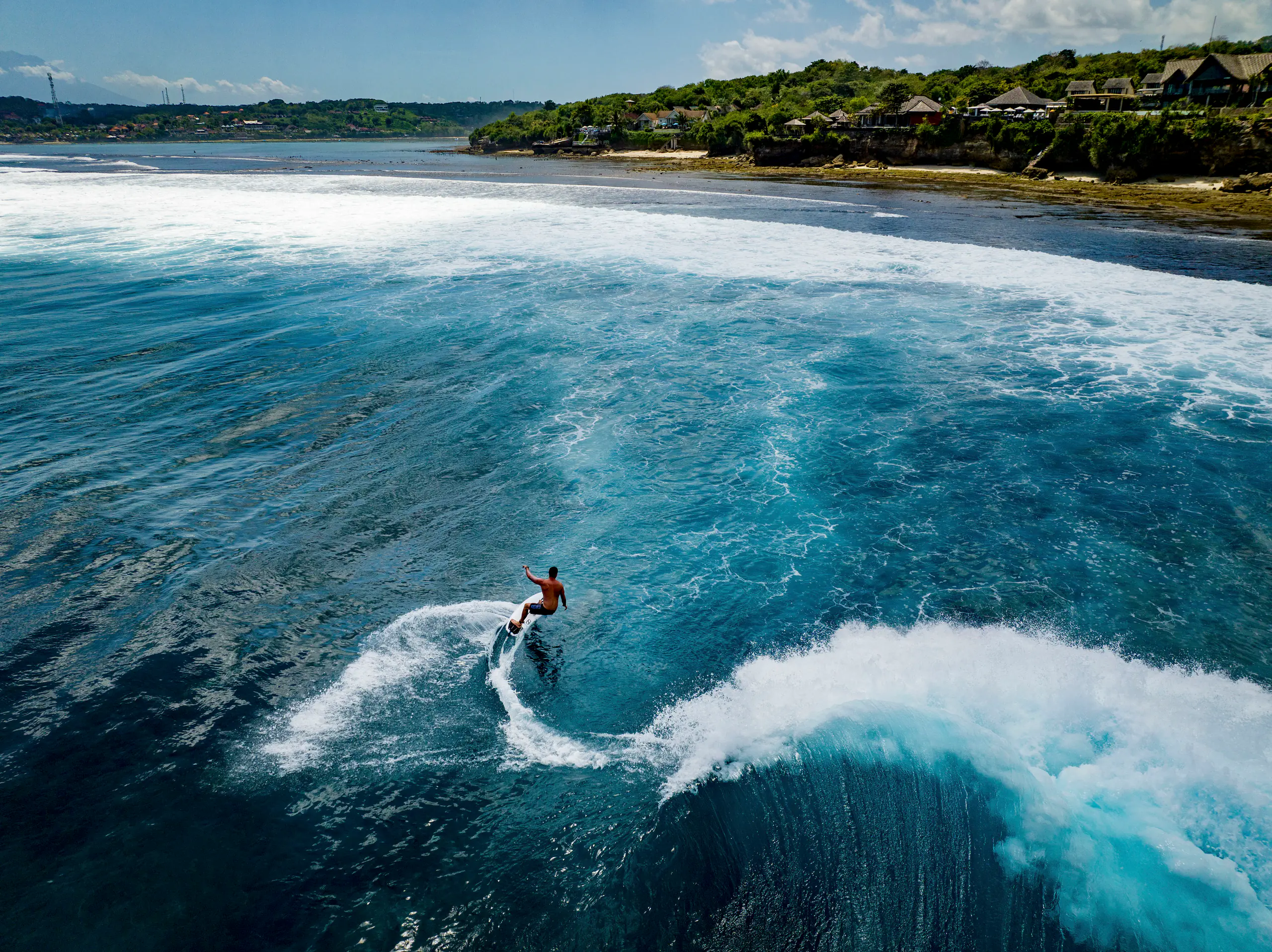 surfers-are-surfing-the-waves-nusa-lembongan-is-a-2026-01-09-11-03-30-utc